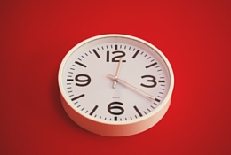 clock on a red wall